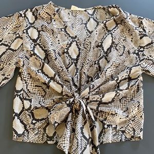 Vestique snakeskin top